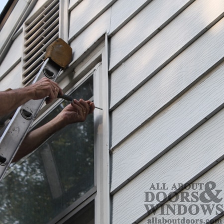 screw storm window